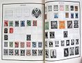 Russian postage stamps on album pages.jpg