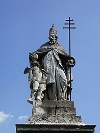 Statue of Pope Sylvester I depicted holding a ferula with a papal cross.