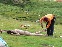 A body being prepared for sky burial in Sichuan Skyburial.JPG