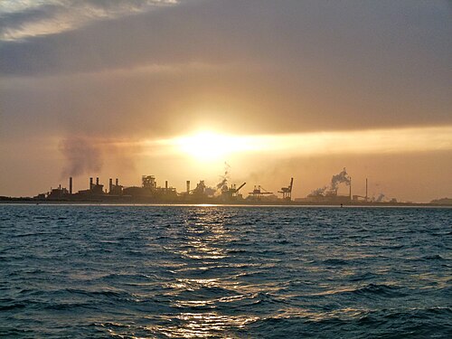 Sunset on industrial port