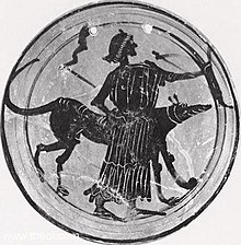 A goddess, probably Hecate (possibly Artemis), is depicted with a bow, dog and twin torches. T16.5Hekate.jpg