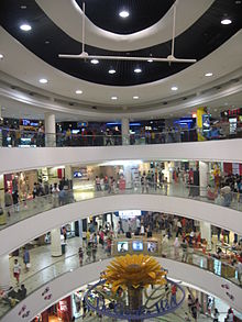 Modern malls have been described as new "cathedrals of consumption". Tampines Mall.JPG