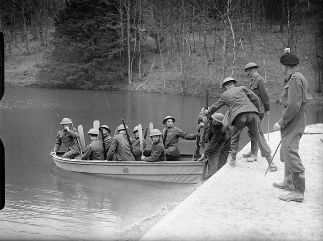 Men of the 1st Battalion, London Irish Rifles training in boat handling on a lake in Pippington Park, East Grinstead, April 1940.