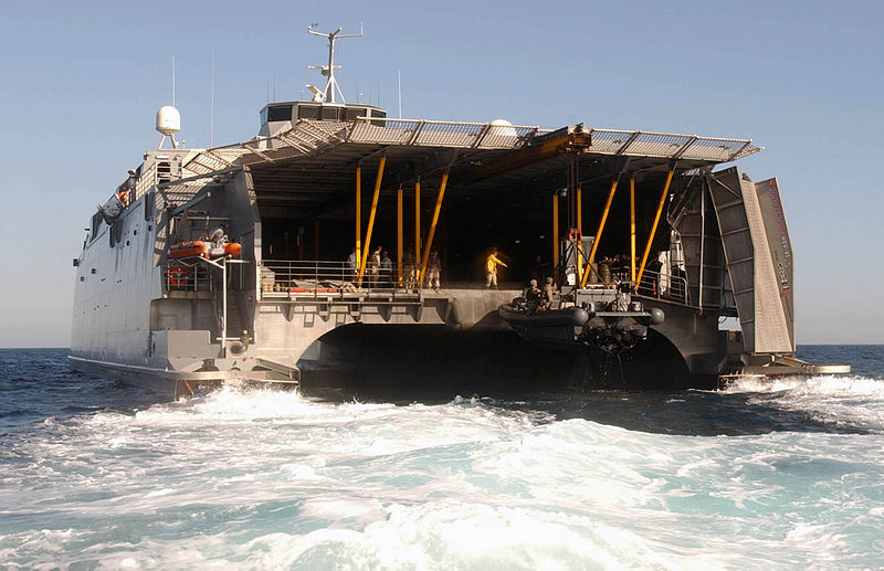 File:US Navy 030525-N-4441P-031 Joint Venture, High Speed Vessel Experimental One (HSV X1) pulls a Special Boat Team (SBT) Rigid Hull Inflatable Boat (RHIB) out of the water.jpg