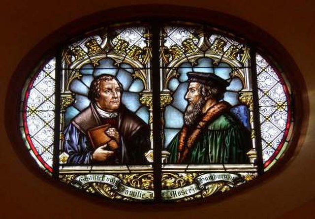 Glass window in the town church of Wiesloch (Stadtkirche Wiesloch) with Martin Luther and John Calvin commemorating the 1821 union of Lutheran and Ref
