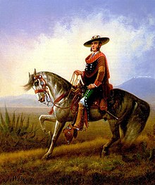 Portrait of a mounted Californio vaquero in traditional clothing 'The Vaquero' by James Walker.jpg