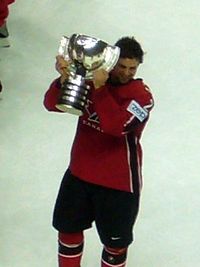 Hamhuis with the IIHF World Championship trophy in 2007 2007 IIHF WC Dan Hamhuis crop.jpg