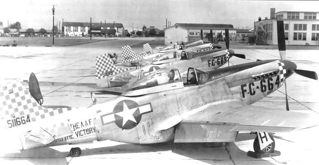 20th Fighter Group P-51D Mustangs parked at Shaw Field, November 1946. Serials identified are 45-11665, 45-11689, and 44-84855. Note the postwar "buzz