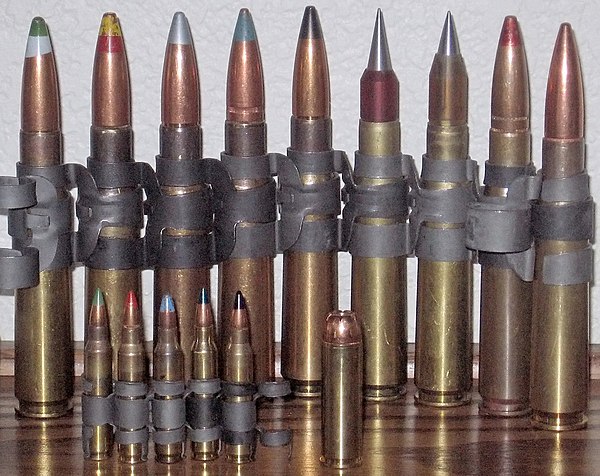 Left to right, rear: green/gray tip Raufoss Mk 211 HEIAP (high-explosive incendiary armor-piercing) yellow/red tip (M48 spotter) silver tip (M8 armor-