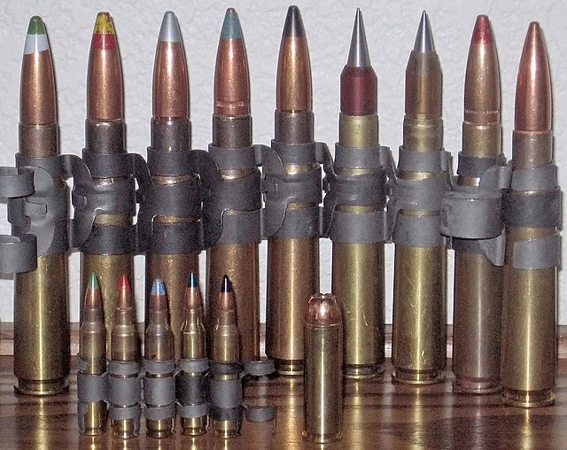 Left to right, rear: green/gray tip Raufoss Mk 211 HEIAP (high-explosive incendiary armor-piercing) yellow/red tip (M48 spotter) silver tip (M8 armor-
