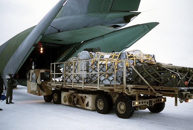 File:A K-loader carrying supplies and equipment backs away from a 437th Military Airlift Wing C-141B Starlifter aircraft following unloading of the plane. The material will be used by Ma - DPLA - 9a3b0b5c26fe43feded0711c52321912.jpeg