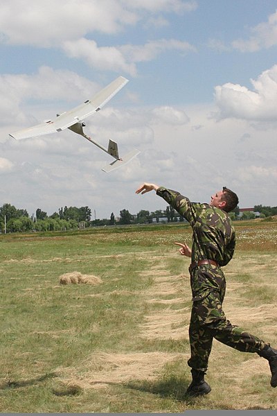 File:A Romanian soldier launches a Raven unmanned aerial vehicle (UAV) at the Romanian Land Forces base in Buzau, Romania, June 2, 2011 110602-M-GN320-004.jpg