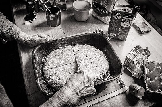 Annie O'Donnell of Gaoth Dobhair, Donegal, Ireland, making traditional treacle bread Photograph: Seán Ó Domhnaill