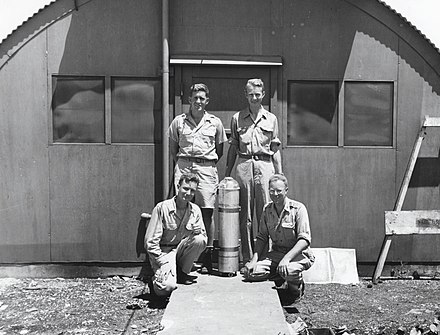Alvarez (top right) on Tinian with Harold Agnew (top left), Lawrence H. Johnston (bottom left) and Bernard Waldman (bottom right)