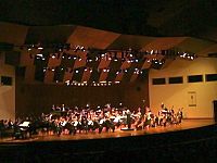 Aldemaro Romero directing the Municipal Symphony Orchestra of Caracas, at the celebration of the 50th anniversary of Dinner in Caracas Aldemaro Romero y OSMC.jpg