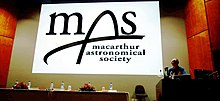 A Macarthur Astronomy Forum being introduced by Macarthur Astronomical Society President, Tony Law. An Evening With The Stars - Before 5 crop.jpg