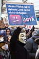 Des manifestants lors d'un rassemblement contre l'introduction du projet de loi ACTA.