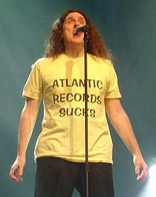 Weird Al wearing his "Atlantic Records Sucks" shirt during a performance of "You're Pitiful", on August 8, 2007, at the Ohio State Fair. Atlantic record sucks shirt your pitiful aug 8th 2007 ohio state fair (cropped).JPG