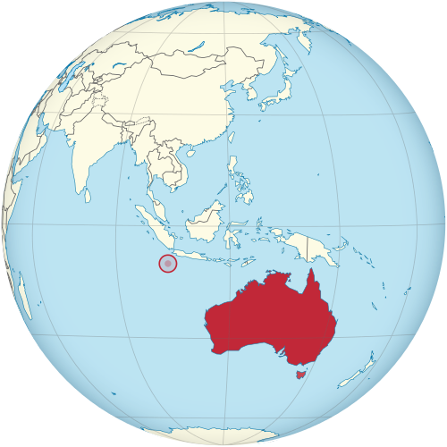 Location of Christmas Island (red circle) and the location of Australia mainland (continent in red)