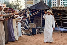 A band performs the Ayyala, which is a cultural dance derived from Arab tribes sword battles. Ayyala.jpg