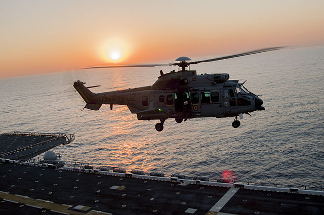 640px-Brazilian_helicopters_conduct_deck_landing_qualifications_aboard_PCU_America_140804-N-LQ799-090.jpg