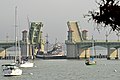 The bridge's bascule draw span open for a ship