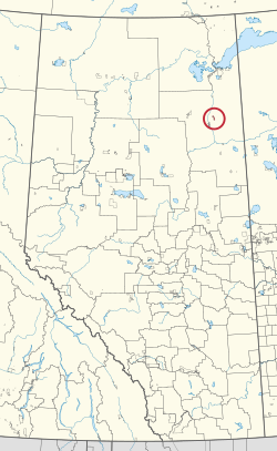 Eine Karte der Provinz Alberta mit 80 Landkreisen und 145 kleinen Indianerreservaten.  Einer ist mit einem roten Kreis hervorgehoben.