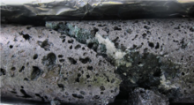 Image of calcite formed in basalt due to CO2-charged water-rock interaction at the Carbfix site CarbFix core.png