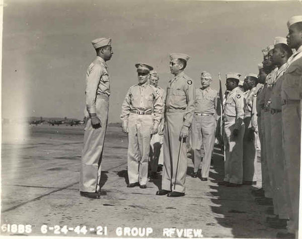 Colonel Robert Selway reviews members of the 618th Bombardment Squadron at Atterbury Air Field in Indiana in 1944.