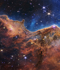 Thumbnail for File:Cosmic Cliffs in the Carina Nebula - left.png