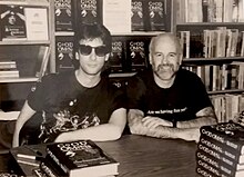 Neil Gaiman and Terry Pratchett signing the first American edition of Good Omens at Minneapolis' DreamHaven Books, in Sept 1990. DreamHaven Good Omens signing.jpg