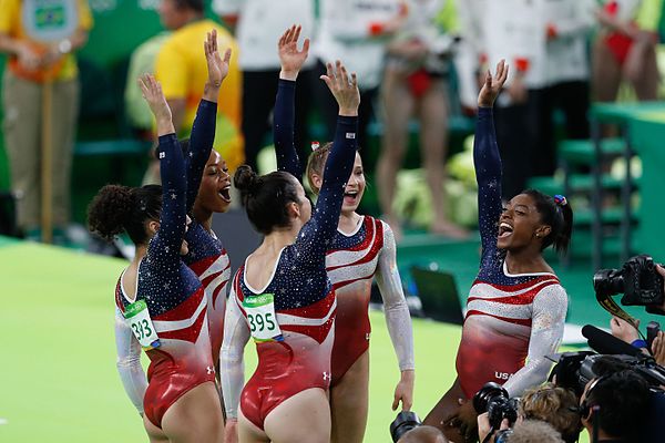 The Final Five celebrating after winning the Women's Team All-Around at the 2016 Summer Olympics