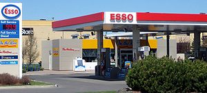 An Esso-branded service station, with On the Run convenience store, in Ottawa, Ontario, Canada (pictured in 2006). Like others in Ontario, the location was sold by Imperial Oil to Couche-Tard in 2016, and the convenience store is now a Circle K. Esso Kanata.jpg