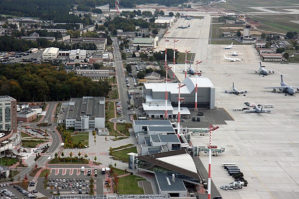 Aerial view of Ramstein showing hangars, warehouses and the passenger terminal alongside the flight line