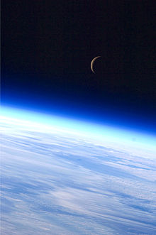 A last-quarter crescent moon above Earth's horizon is featured in this image photographed by an Expedition 24 crew member. Expedition 24 Crescent Moon.jpg