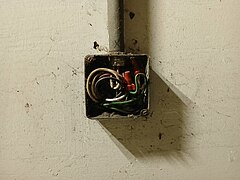 Exposed and abandoned electrical wiring in the old garage.jpg