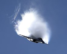 A VFA-122 F/A-18F pulling a high-g maneuver at the NAS Oceana In Pursuit of Liberty air show, 2004