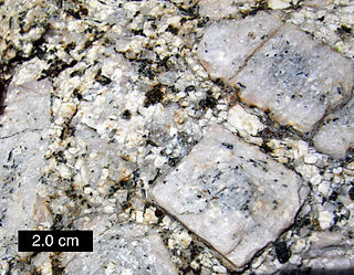 Matrix (geology) Finer-grained material in a rock within which coarser material is embedded