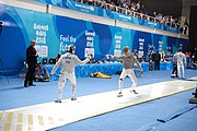 Deutsch: Fechten bei den Olympischen Jugend-Sommerspielen 2018: Tag 1, 7. Oktober 2018, Jungen, Säbel, Runde der letzten 16 - Ali Al-Bahrani (KSA) Vs Antonio Heathcock (GER) 9:15 English: Fencing at the 2018 Summer Youth Olympics at 7 October 2018 – Boys' sabre Round of 16 – Ali Al-Bahrani (KSA) Vs Antonio Heathcock (GER) 9:15