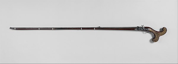 A heavily decorated 18th-century Bondikula flintlock musket from the Kingdom of Kandy is an example of flintlock usage in Asia