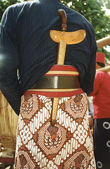 Formal Batik Sarong worn by guard with sword at Sultan's Palace,Yogyakarta.jpg