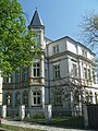 Villa mit Einfriedung