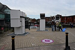 The 'Invisible City' installation for the 2023 Freedom Festival in Kingston upon Hull. It is seen here under installation by an artist collective from Berlin, so the spraypaint claims.