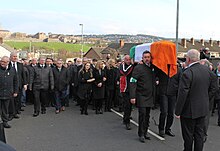 The funeral procession of Sinn Fein politician Martin McGuinness in Derry, 2017 Funeral of Martin McGuinness (2).jpg