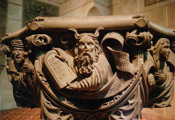 Moses on the baptismal font in the Church of St. Amandus