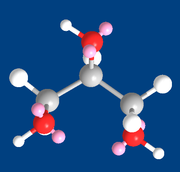 Glicerol (modelo 3D), mostrando los átomos y el par solitario de electrones de cada oxígeno (en rosa)