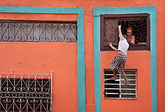 Painting an iron curling grid. Havana (La Habana), Cuba