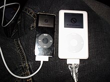An iPod Nano showing a grayscale "Do Not Disconnect" screen from the iPod Mini series with a new screen on the iPod Classic, although it is bundled with the Rockbox package. IPod Nano 1G 4GB On Rockbox & iPod Classic 4G 20GB Do Not Disconnect.jpg