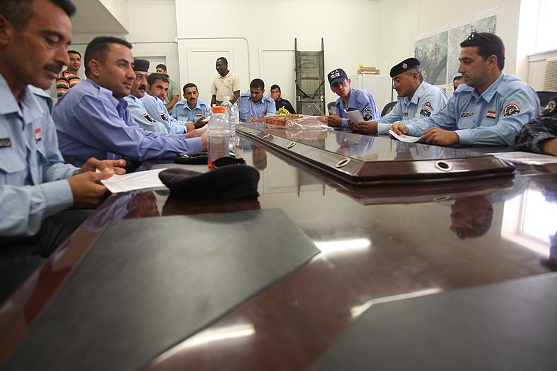 File:Iraqi police officers listen to a briefing before a crime scene exploitation training exercise held at Asad Air Base, Iraq, July 6, 2011 110706-A-EM978-093.jpg