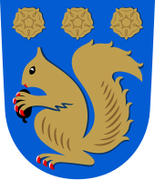 A red squirrel in the coat of arms of Kauniainen, a town in Finland Kauniainen.vaakuna.svg
